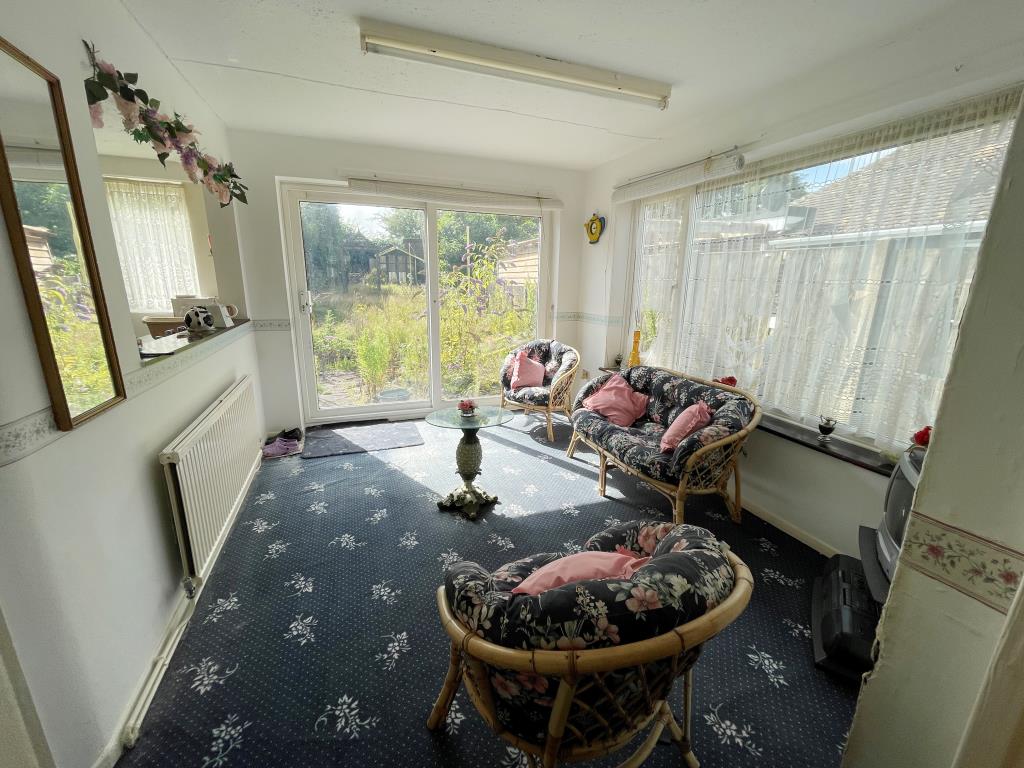 Lot: 63 - TWO-BEDROOM HOUSE FOR REFURBISHMENT - Dining room with access to garden